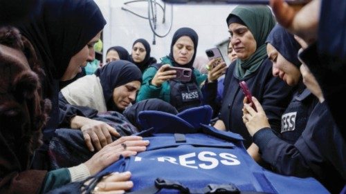 Mourners react next to the body of Palestinian journalist Shatha Al Sabbagh, who was shot during ... Mourners react next to the body of Palestinian journalist Shatha Al Sabbagh, who was shot during ...