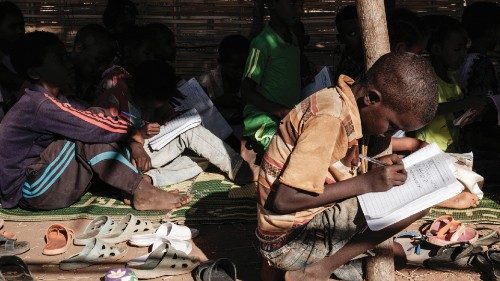 Ethiopian refugee grade four pupils who fled the Tigray conflict attend class at a makeshift ...