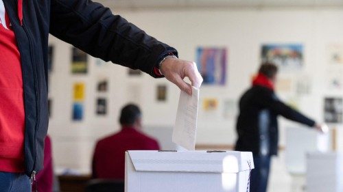 A man casts his ballot to vote during the country's presidential elections at a polling station in ... A man casts his ballot to vote during the country's presidential elections at a polling station in ...