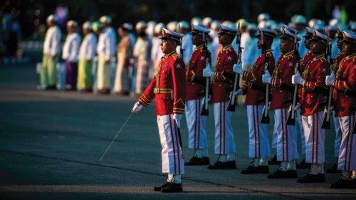 Members of a Myanmar military honour guard take part in a ceremony to mark Myanmar's 77th ... Members of a Myanmar military honour guard take part in a ceremony to mark Myanmar's 77th ...