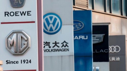 epa11808530 The Volkswagen logo is seen between other auto brands outside a store in Shanghai, ... epa11808530 The Volkswagen logo is seen between other auto brands outside a store in Shanghai, ...