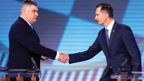 Croatian President and Presidential candidate Zoran Milanovic shake hand with Presidential candidate ... Croatian President and Presidential candidate Zoran Milanovic shake hand with Presidential candidate ...
