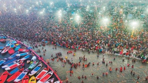 **EDS: THIRD PARTY IMAGE** In this image released by @PIB_India on X on Jan. 13, 2025, Devotees take ...