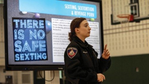 STAMFORD, CONNECTICUT - OCTOBER 24: Stamford Police Department officer Melanie Miscoiscia speaks to ... STAMFORD, CONNECTICUT - OCTOBER 24: Stamford Police Department officer Melanie Miscoiscia speaks to ...
