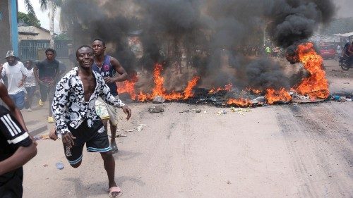 Tires and other objects burn while protesters demonstrate in Kinshasa, Democratic Republic of Congo, ... Tires and other objects burn while protesters demonstrate in Kinshasa, Democratic Republic of Congo, ...