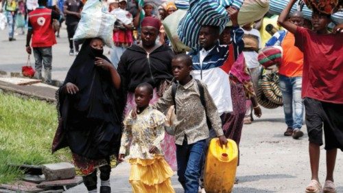 Congolese civilians who fled from Goma, in eastern Democratic Republic of the Congo, following ...