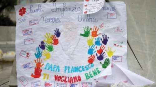 A drawing of Pope Francis with well-wishes from school children is placed outside Gemelli Hospital, ... A drawing of Pope Francis with well-wishes from school children is placed outside Gemelli Hospital, ...