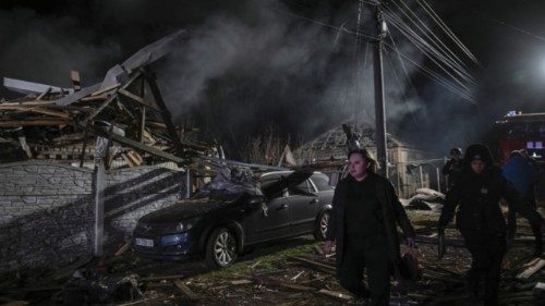 An emergency psychologist responds to assist a resident at the site of a Russian drone strike, amid ... An emergency psychologist responds to assist a resident at the site of a Russian drone strike, amid ...