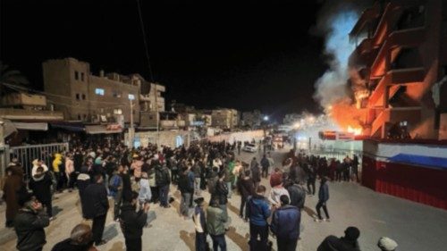 People gather as smoke rises following an Israeli airstrike at Nasser hospital, according to the ... People gather as smoke rises following an Israeli airstrike at Nasser hospital, according to the ...
