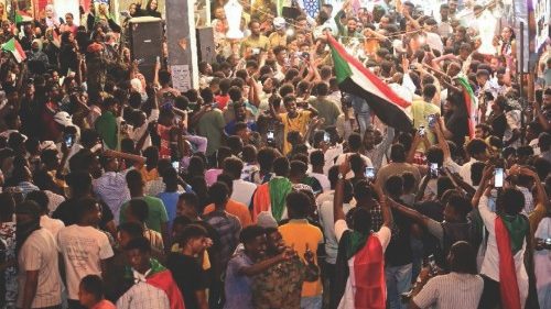 Sudanese citizens celebrate on a street after the Sudanese army deepened its control over the ... Sudanese citizens celebrate on a street after the Sudanese army deepened its control over the ...