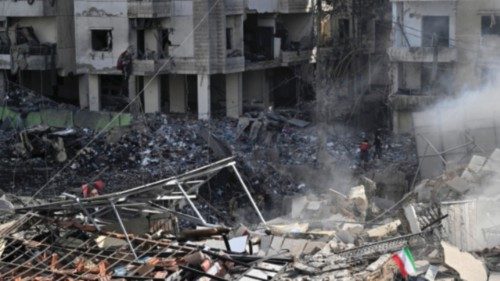 epa11994960 Rescue workers search for victims in the rubble of a building following an Israeli air ... epa11994960 Rescue workers search for victims in the rubble of a building following an Israeli air ...