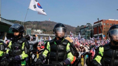 Riot police stand guard in front of supporters of South Korea president Yoon Suk Yeol waiting for ... Riot police stand guard in front of supporters of South Korea president Yoon Suk Yeol waiting for ...