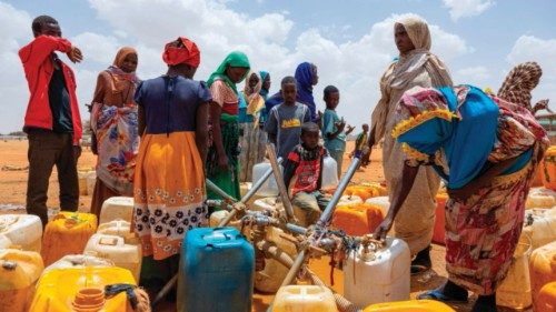 Sudanese refugees fill jerry cans with water at the Touloum refugee camp in the Wadi Fira province, ... Sudanese refugees fill jerry cans with water at the Touloum refugee camp in the Wadi Fira province, ...