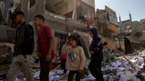 epa12038412 Palestinians walk among the rubble of the Maqdad (Nasawi) family home, which was ... epa12038412 Palestinians walk among the rubble of the Maqdad (Nasawi) family home, which was ...