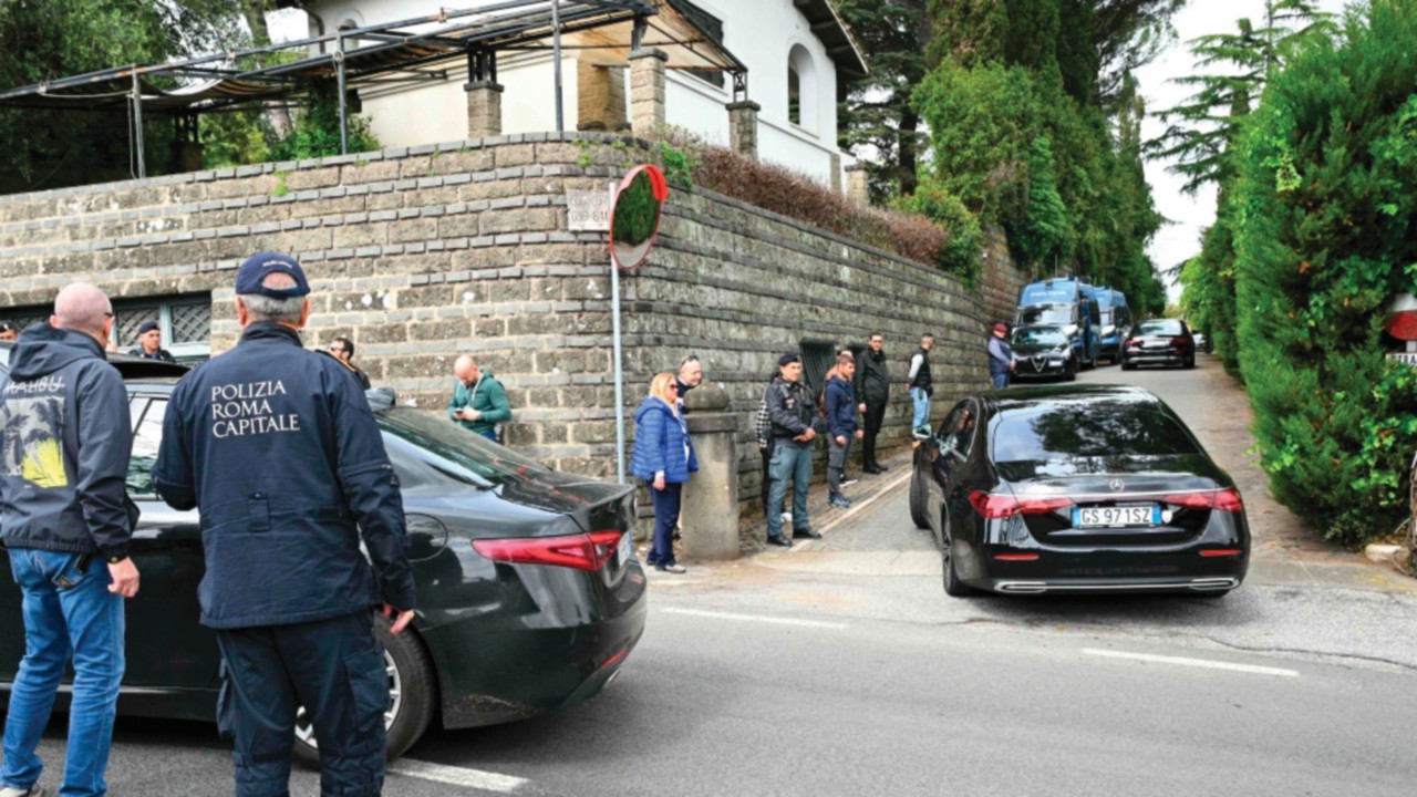 Vehicles of the Iranian delegation are escorted by Italian police at one of the entrance of the ...