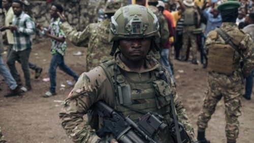 (FILES) M23 soldiers are seen at the Stade de l'Unite' (Unity Stadium in French) in Goma on February ... (FILES) M23 soldiers are seen at the Stade de l'Unite' (Unity Stadium in French) in Goma on February ...
