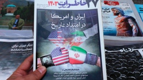 This picture shows a magazine front page at a kiosk in Tehran on April 19, 2025, featuring the ... This picture shows a magazine front page at a kiosk in Tehran on April 19, 2025, featuring the ...