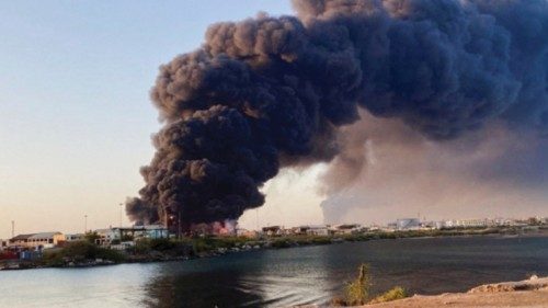 A view shows a large plume of smoke and fire rising from fuel depot in Port Sudan, Sudan, May 6, ... A view shows a large plume of smoke and fire rising from fuel depot in Port Sudan, Sudan, May 6, ...