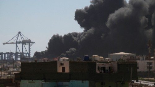 Smoke billows after a drone strike on the port of Port Sudan on May 6, 2025. Drones struck the ... Smoke billows after a drone strike on the port of Port Sudan on May 6, 2025. Drones struck the ...