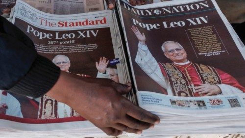 A newspaper vendor arranges The Standard (L) and Daily Nation (R) newspapers with front pages ... A newspaper vendor arranges The Standard (L) and Daily Nation (R) newspapers with front pages ...