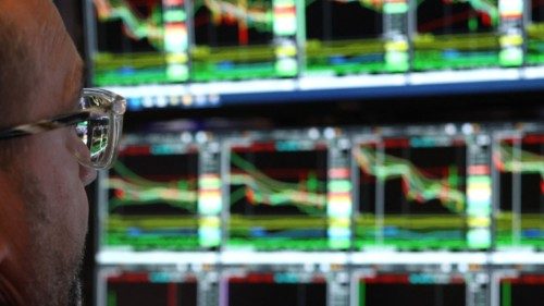 A trader looks at different stock indexes on the floor of the New York Stock Exchange (NYSE) at the ... A trader looks at different stock indexes on the floor of the New York Stock Exchange (NYSE) at the ...