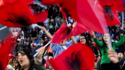 Supporters of the Socialist party wave Albanian national flags during the final rally of Leader of ... Supporters of the Socialist party wave Albanian national flags during the final rally of Leader of ...