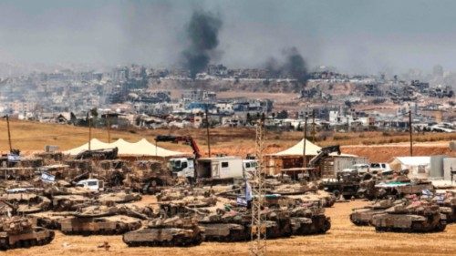 This picture taken from a position in southern Israel on the border with the Gaza Strip shows ... This picture taken from a position in southern Israel on the border with the Gaza Strip shows ...
