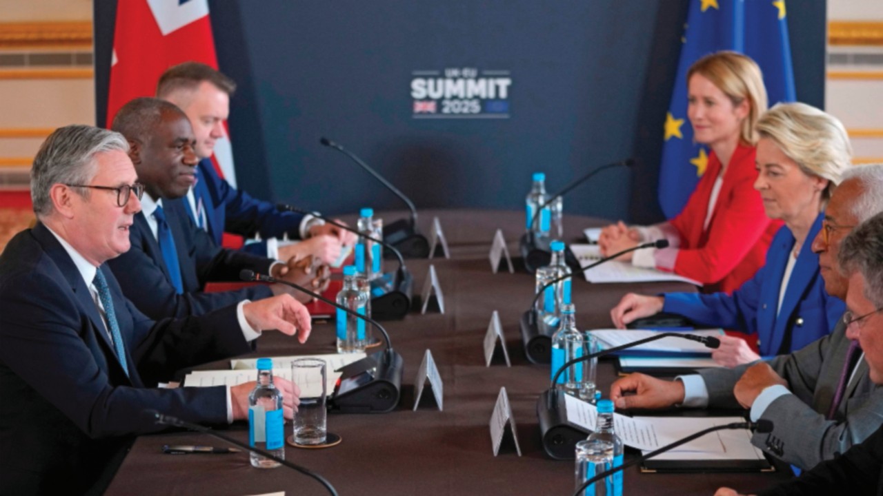 Britain's Prime Minister Keir Starmer (L), Britain's Foreign Secretary David Lammy (2L), Britain's ...