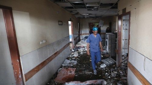 Palestinian hospital staff inspect the destruction inside Nasser hospital in Khan Yunis in the ... Palestinian hospital staff inspect the destruction inside Nasser hospital in Khan Yunis in the ...