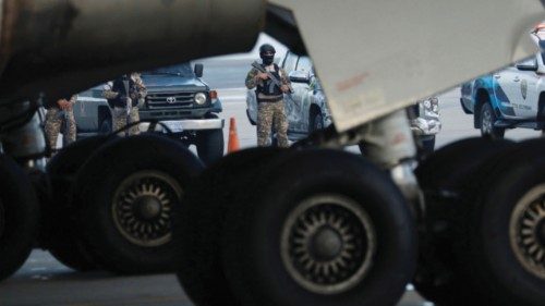 Members of Venezuela's DGCIM (General Directorate of Military Counterintelligence) stand guard as ... Members of Venezuela's DGCIM (General Directorate of Military Counterintelligence) stand guard as ...