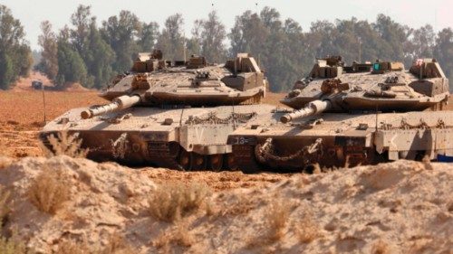 Israeli army tanks take position at the border between Israel and the Gaza Strip on May 22, 2025, ... Israeli army tanks take position at the border between Israel and the Gaza Strip on May 22, 2025, ...