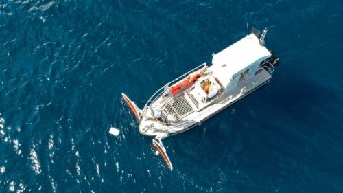This aerial photograph taken on October 2, 2022 shows Marecorsica's boat capitan Bilal El Ouardani ... This aerial photograph taken on October 2, 2022 shows Marecorsica's boat capitan Bilal El Ouardani ...
