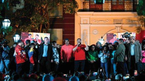 Deputy candidate Nicolas Maduro Guerra (C) speaks to supporters next to his father, Venezuelan ... Deputy candidate Nicolas Maduro Guerra (C) speaks to supporters next to his father, Venezuelan ...