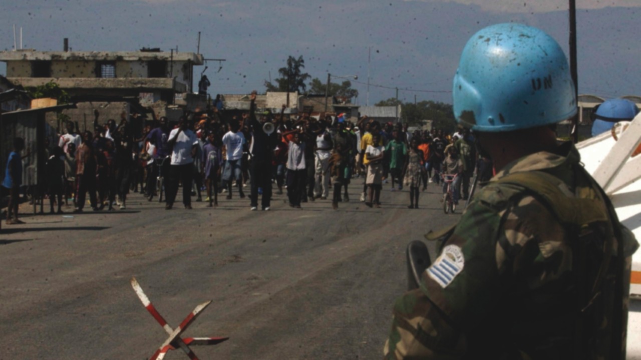 epa12138727 Soldiers of the United Nations Stabilization Mission in Haiti (MINUSTAH) patrol the ...