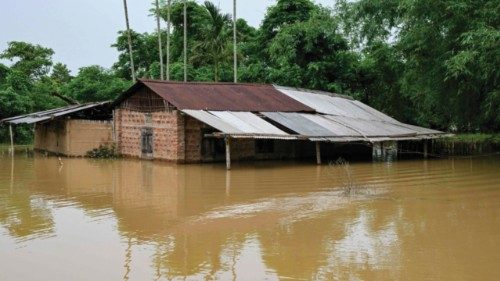 A house lies partially submerged in floodwaters after heavy rains in Kampur at Nagaon district, in ... A house lies partially submerged in floodwaters after heavy rains in Kampur at Nagaon district, in ...