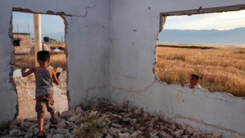 Children play in a destroyed house in the village of al-Hawash in Syria's west-central Hama province ... Children play in a destroyed house in the village of al-Hawash in Syria's west-central Hama province ...