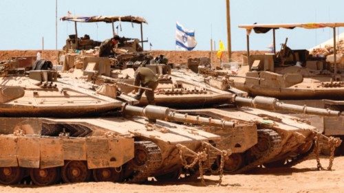 Israeli tanks are positioned along the border with the Gaza Strip on June 5, 2025, amid the ongoing ... Israeli tanks are positioned along the border with the Gaza Strip on June 5, 2025, amid the ongoing ...