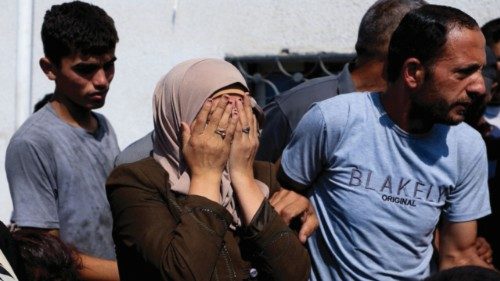 Mourners react during the funeral of Palestinians killed by Israeli fire, according to the Gaza ... Mourners react during the funeral of Palestinians killed by Israeli fire, according to the Gaza ...