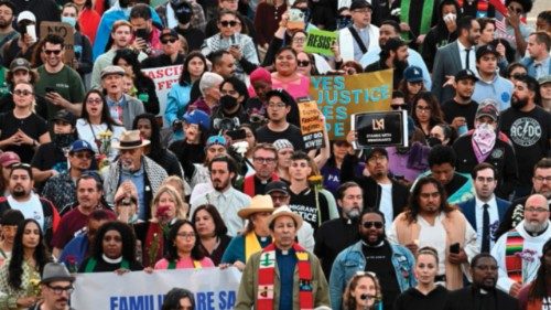 People attending a prayer vigil walk to the Federal Building in downtown Los Angeles as protests ... People attending a prayer vigil walk to the Federal Building in downtown Los Angeles as protests ...