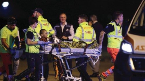 A boy is carried on a stretcher towards an ambulance, after the aircraft carrying Adam Al-Najjar, a ... A boy is carried on a stretcher towards an ambulance, after the aircraft carrying Adam Al-Najjar, a ...