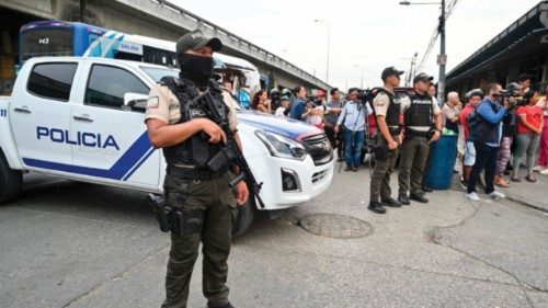 Police stand guard at the site where eight people were killed in Pascuales District, Guayaquil, ... Police stand guard at the site where eight people were killed in Pascuales District, Guayaquil, ...