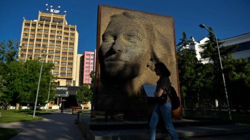 A pedestrian walks past a memorial dedicated to survivors of sexual violence during the war in ... A pedestrian walks past a memorial dedicated to survivors of sexual violence during the war in ...