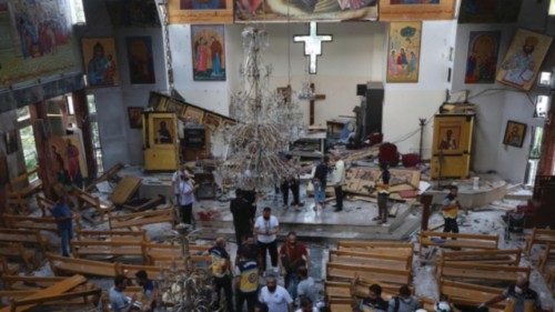 epaselect epa12191552 Emergency services work at the scene of a suicide bombing at Mar Elias Church ... epaselect epa12191552 Emergency services work at the scene of a suicide bombing at Mar Elias Church ...