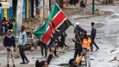 epa12222995 A Kenyan protester waves the Kenyan flag during anti-government protests on Saba Saba ... epa12222995 A Kenyan protester waves the Kenyan flag during anti-government protests on Saba Saba ...