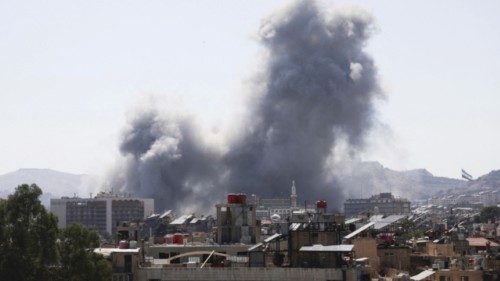 Smoke rises from a building after strikes at Syria's defense ministry in Damascus, Syria, July 16, ... Smoke rises from a building after strikes at Syria's defense ministry in Damascus, Syria, July 16, ...