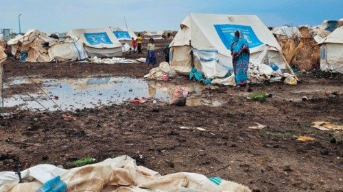 Mud covers the ground around tents at the Abu Al-Naja camp for displaced Sudanese in the eastern ... Mud covers the ground around tents at the Abu Al-Naja camp for displaced Sudanese in the eastern ...