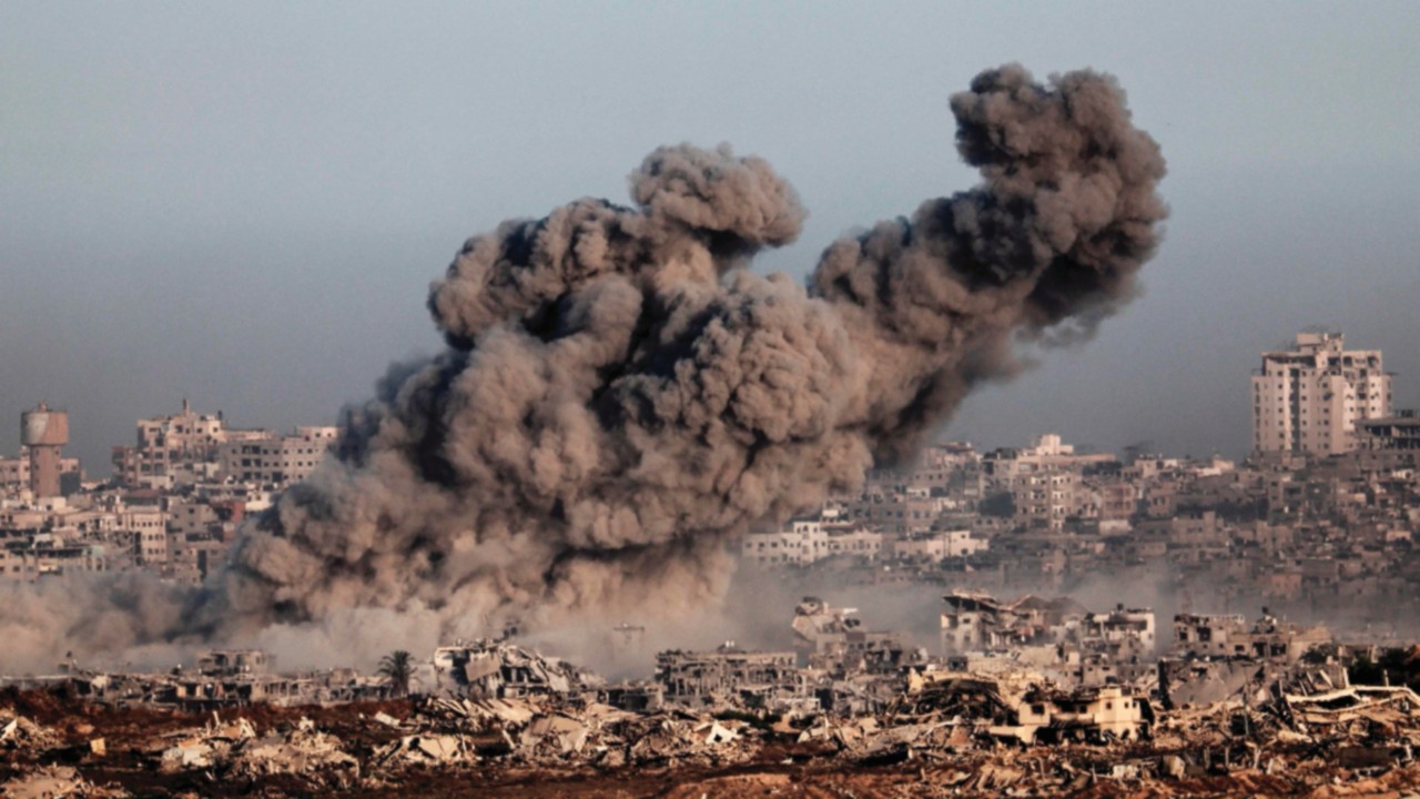 This picture taken from a position at Israel's border with the Gaza Strip shows smoke billowing ...