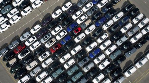 A drone view shows new cars parked, imported or waiting to be exported, in the port of Zeebrugge, ...
