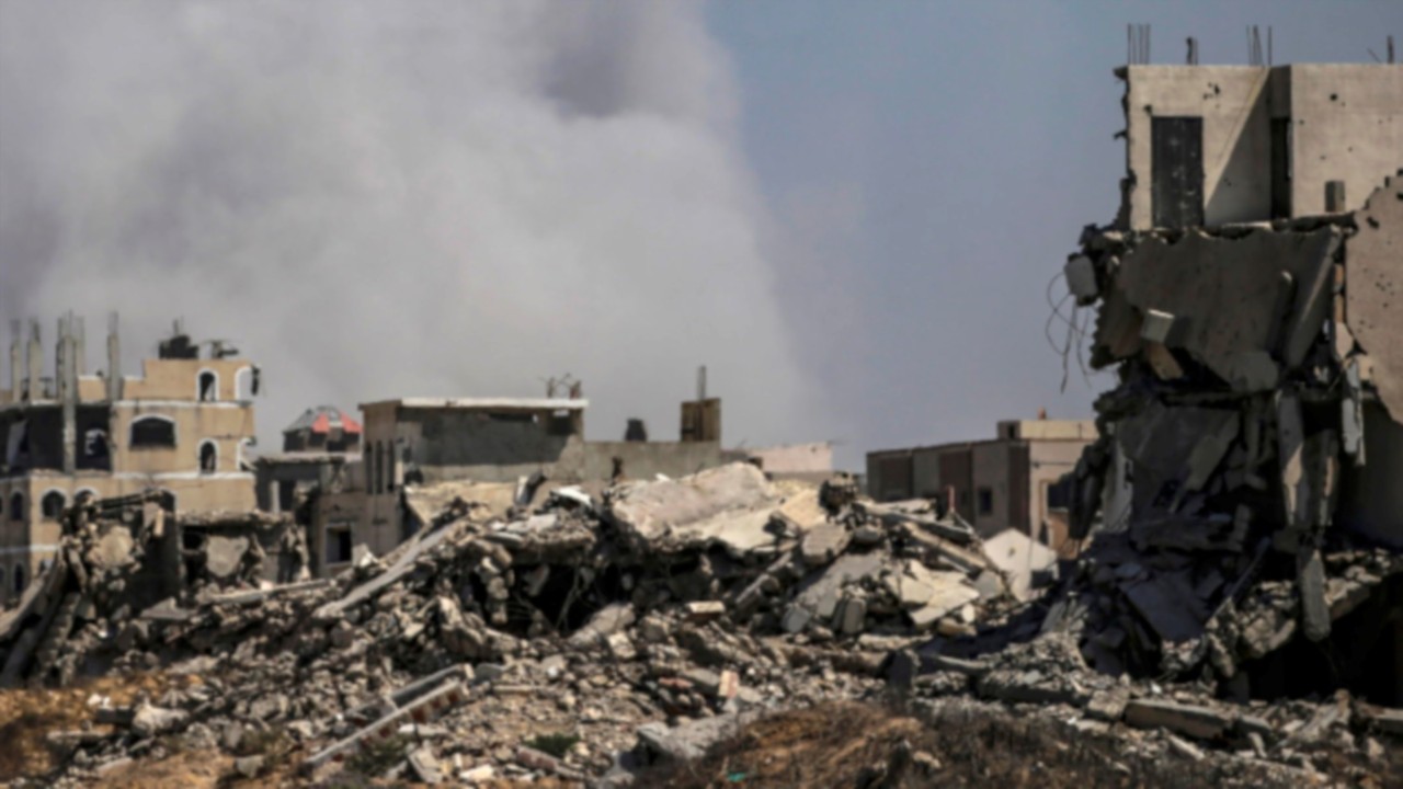 epa12249922 Smoke rises following an israeli air strike near Zikim, northern Gaza Strip, 20 July ...