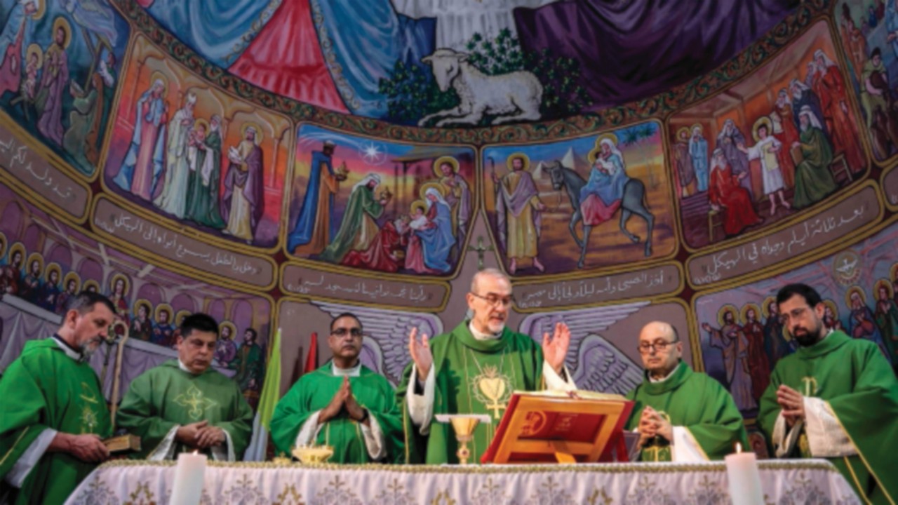 TOPSHOT - Cardinal Pierbattista Pizzaballa, Latin Patriarch of Jerusalem, leads prayers at the ...